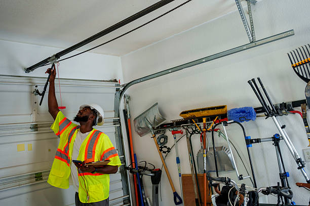 Professional Garage Door Panel Replacement technician working in Carrington, ND